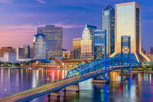 Jacksonville_Florida_USA_downtown_skyline_at_dusk_over_St_Johns_River_terrenosnaflorida-com_shutterstock_1099656485_1200x680