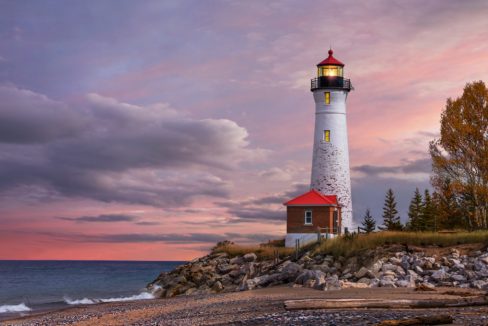 Lighthouse_at_sunset_on_Lake_Superior_Upper_Peninsula_Michigan_USA_terrenosnaflorida-com_shutterstock_472318273_1200x680