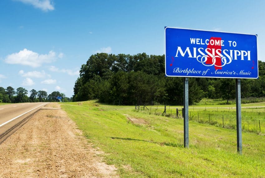 Mississippi_State_welcome_sign_along_the_US_Highway_61_in_the_USA_terrenosnaflorida-com_shutterstock_580178374_1200x680