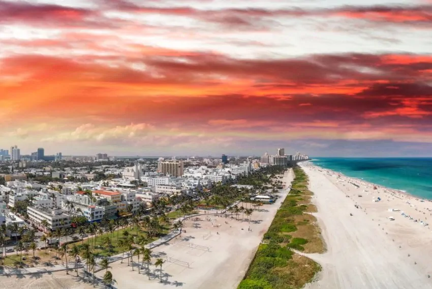 Panoramic_aerial_view_of_Miami_Beach_coastline_and_skyline_Florida_terrenosnaflorida-com_shutterstock_1148262332_1200x680